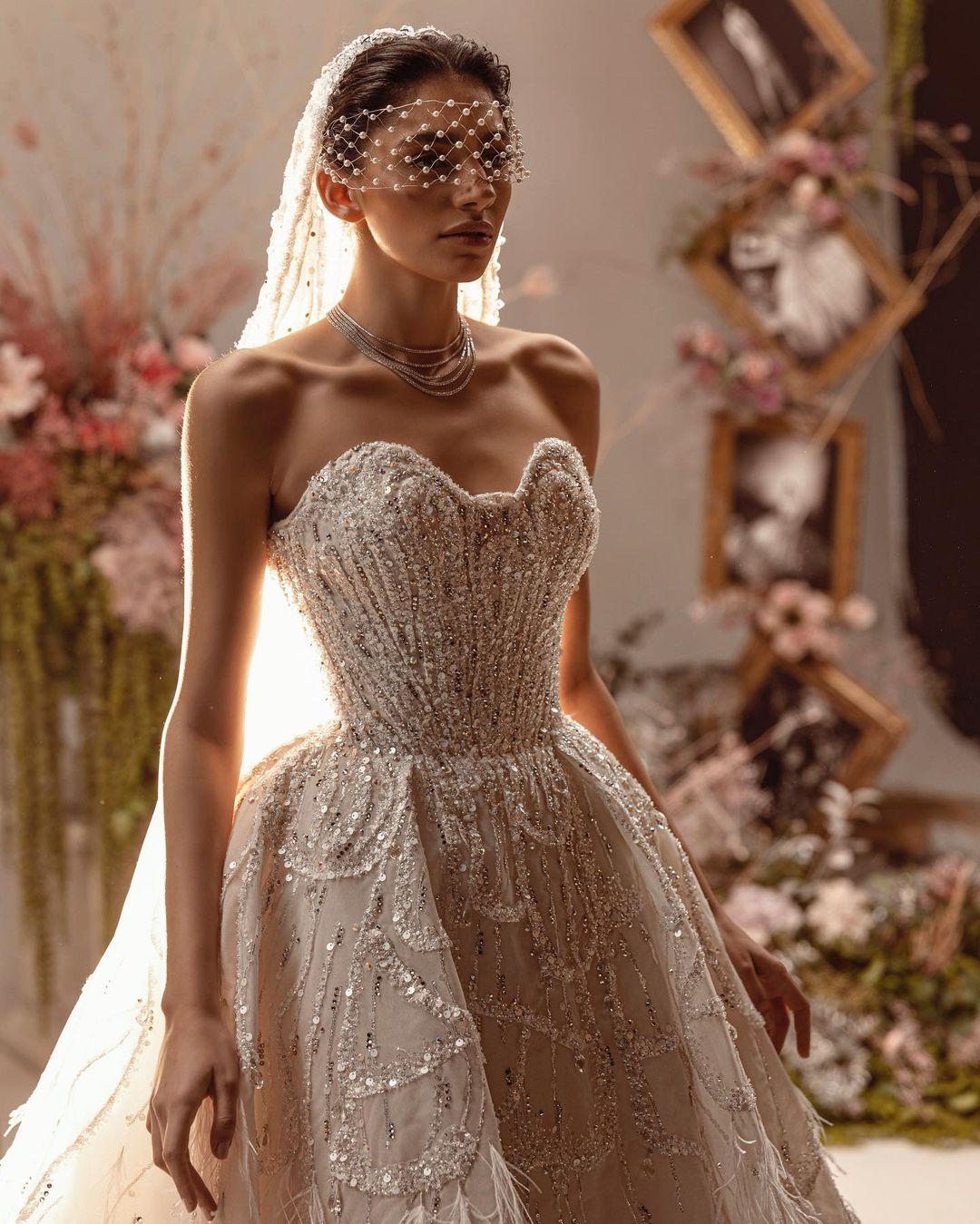 Reem Kachmar Bridal collection 2022 
Fabulously combine ultra feminine structured corset bodice with shimmering beaded patterns and exquisite feather and floral applique for a Glamorous Modern and Timeless Bride . 

#kachmarreem #reemkachmarcouture #reemkachmar #reemkachmar2022 #reemkachmarbridal22 #couture #fashion #brides #weddinggown #weddingdress #abudhabi #love #her #beirut #lebanon #riyadh #jeddah #dubai #cairo #kuwait #doha #instafashion #instacouture #kachmarreem #instabride #ss22