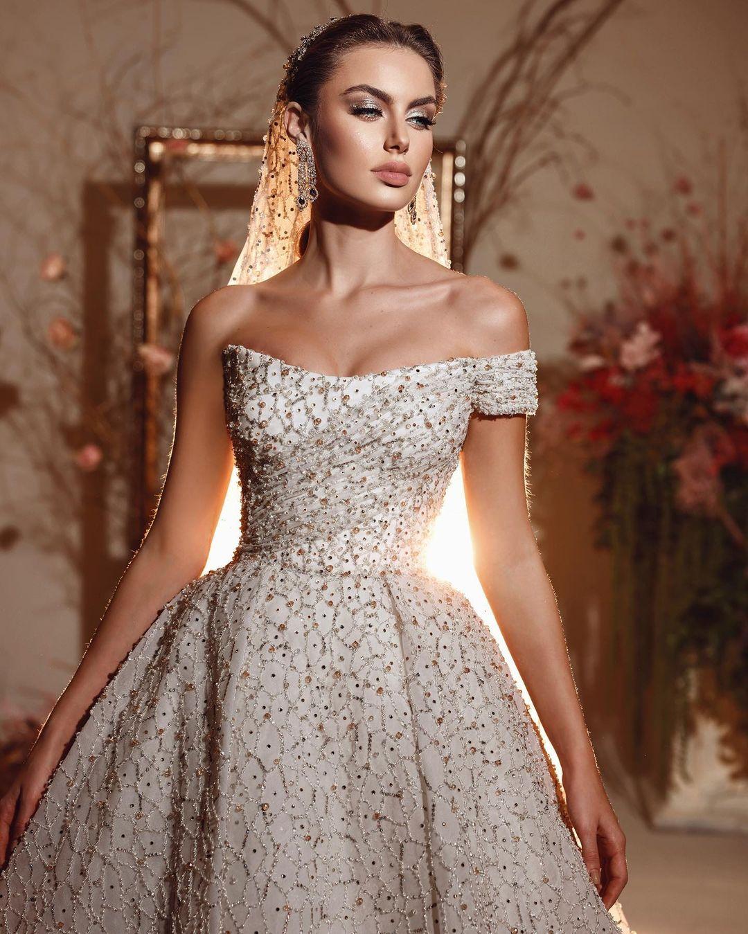 Reem Kachmar Bridal collection 2022 
Fabulously combine ultra feminine structured corset bodice with shimmering beaded patterns and exquisite feather and floral applique for a Glamours Modern and Timeless Bride . 

#kachmarreem #reemkachmarcouture #reemkachmar #reemkachmar2022 #reemkachmarbridal22 #couture #fashion #brides #weddinggown #weddingdress #abudhabi #love #her #beirut #lebanon #riyadh #jeddah #dubai #cairo #kuwait #doha #instafashion #instacouture #kachmarreem #instabride #ss22