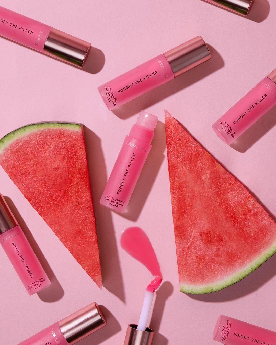 class="content__text"
 We don't know who needs to hear this but... lip plumpers DO NOT have to burn to work 👏

Take a peek at our newest obsession -- Forget The Filler Lip-Plumping Gloss in Juicy Watermelon 👇
1️⃣ It’s a stunning sheer watermelon shade with a pearl finish and has a DELICIOUS watermelon scent 🍉
2️⃣ It’s packed with CLEAN and CLINICALLY PROVEN ingredients that work to PLUMP, SMOOTH, and HYDRATE lips 💦 without burning or irritating! 🙅‍♀️
3️⃣ Immediately after application lip lines look filled and the lip surface looks smooth af leaving you with an ultra-glossy, glass-like finish ✨

Proof in the PLUMP 👄👇
Powered by MAXI-LIP™ 💋 — In an independent study on 10 women ages 22-40 on MAXI-LIP™, it was noted:
👄 Improved lip condition by +100%
👄 Improved lip hydration +60%
👄 Increased lip volume +40%

Shop on Lawlessbeauty.com or at #Sephora! 
 