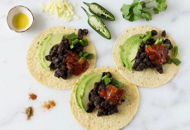 Treat yourself to taco time! Tacos are a great vehicle for soaking up flavors and filling with all kinds of stuffings! Protein-rich black beans, your favorite salsa and creamy avocado come together for the simplest of meals that satisfies every time. Top these tacos with some extra additions to mix it up and make it your own! 

🌱 Recipe Link in Bio
✨ Join Us: meals.whatthehealthfilm.com

.
.
.
#wthfilm #whatthehealth #wthmealplanner #plantbased #plantbasedrecipes #tacos #tacotime