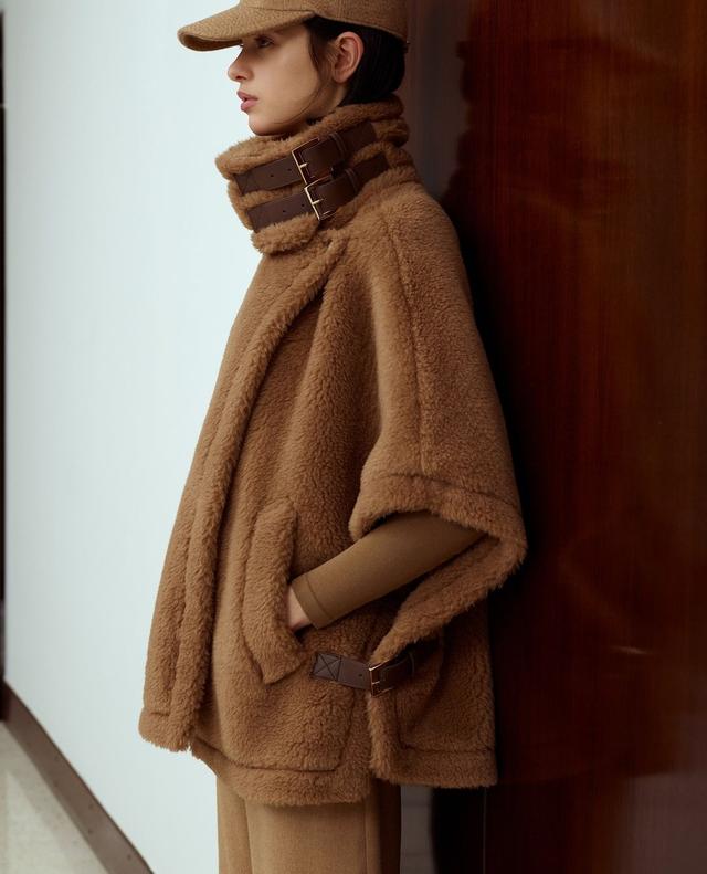 
 Stay warm in the new #MaxMaraTeddyBear cape. Discover this season's pieces in the iconic Teddy fabric through the link in bio. #MaxMara 
 
