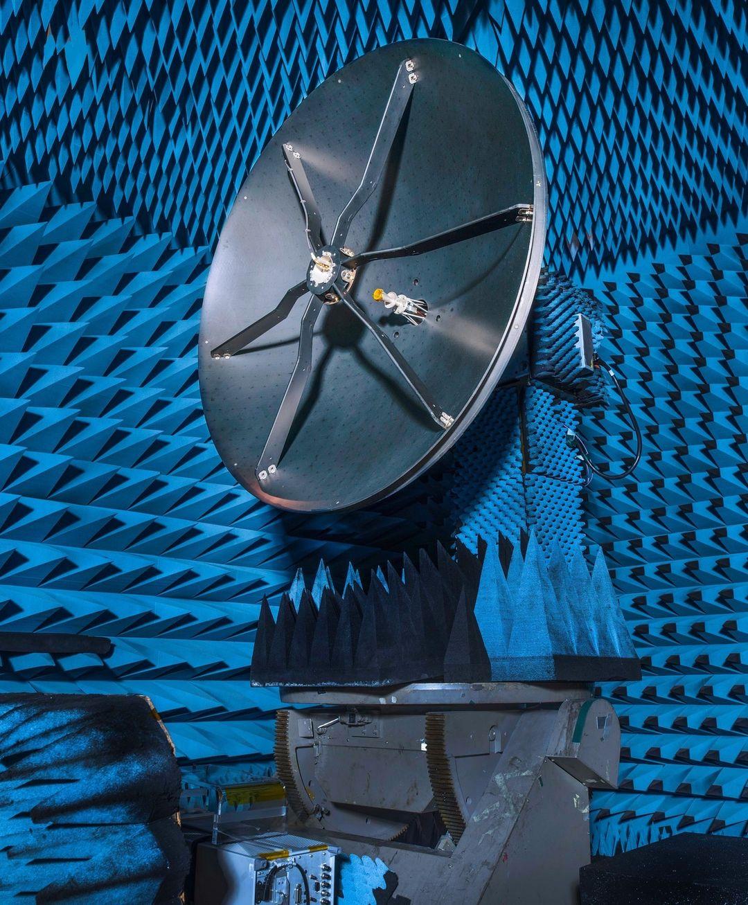 
 With a dish this big, we can stay connected even a million miles away in space! The Nancy Grace Roman Space Telescope’s high-gain antenna has completed a series of tests at NASA's Goddard Space Flight Center. 

One of those tests was in the radio-frequency anechoic test chamber, ensuring Roman’s signal will be crystal clear back here on Earth. The foam spikes lining the chamber make sure there is minimal interference during testing. 

Next steps: the antenna will be attached to its articulating boom assembly in the Goddard clean room!

Click the link in our bio to learn more about Roman’s high-gain antenna 📡

Credit: NASA/Chris Gunn

Image Description:

Image 1: Wide shot of the Nancy Grace Roman Space Telescope’s high-gain antenna inside a testing chamber that is covered in blue spiked-shaped foam. The antenna is a large grey dish, about the height of a refrigerator, facing slightly to the left. There is a small circle that is elevated in the middle of the antenna disk by six metal strips. 
The antenna is mounted to a base that is also covered in blue spikes. 

Image 2:Close-up of the Nancy Grace Roman Space Telescope’s high-gain antenna inside a testing chamber that is covered in blue spiked-shaped foam. The antenna is a large grey dish, about the height of a refrigerator, facing slightly to the right. There is a small circle that is elevated in the middle of the antenna disk by six metal strips.
There are small faint black circles that cover the disk. 

Image 3:Close-up of the spiked-shaped blue foam covering the walls of the chamber. 
 